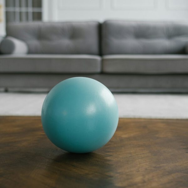 Blue Fitness Ball on the Floor of the House for Morning Gymnastics